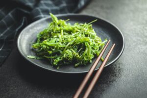 Green wakame. Seaweed salad.
